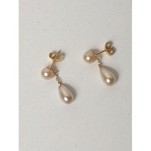 5 - 9ct yellow gold and pearl 2cm drop earrings. Shipping Group (A).