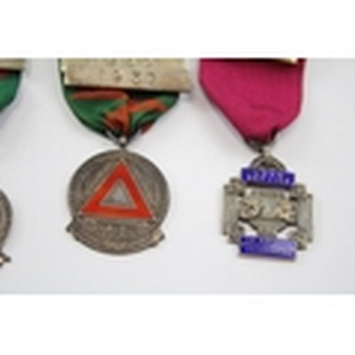 69 - 3 hallmarked sterling silver medals to include 2 drivers awards, approx gross weight 65g. Shipping G... 