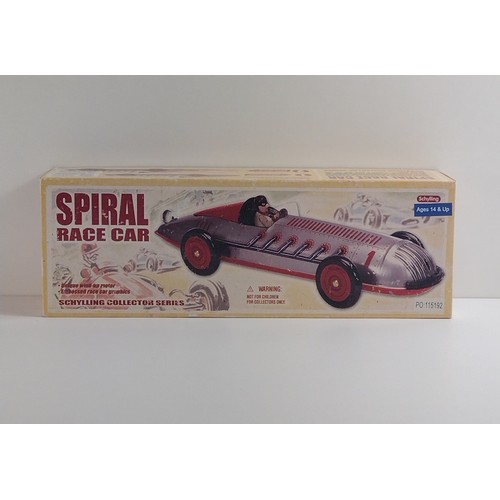 76 - Schylling Collector Series Spiral tinplate race car in original box. Shipping Group (A).