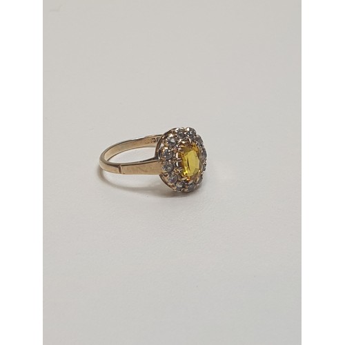 49 - 9ct gold citrine and cubic zirconia set ring. Hallmark for Birmingham. Size M½. Shipping Group (A).