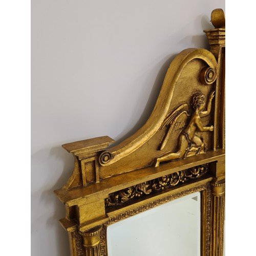 2 - A superb and imposing three-section plate mirror glass overmantel, having gilt frame, inset cherub f... 