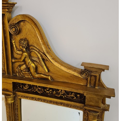 2 - A superb and imposing three-section plate mirror glass overmantel, having gilt frame, inset cherub f... 