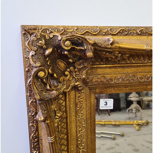 3 - A large French style bevel edged mirror in gilt frame measuring 159 (h) x 129 (w) cm.