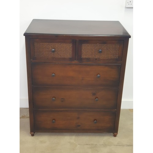 16 - A modern 2 over 3 chest of drawers featuring cane effect inset panels. 150 (h) x 89 (w) x 53 (d) cm.