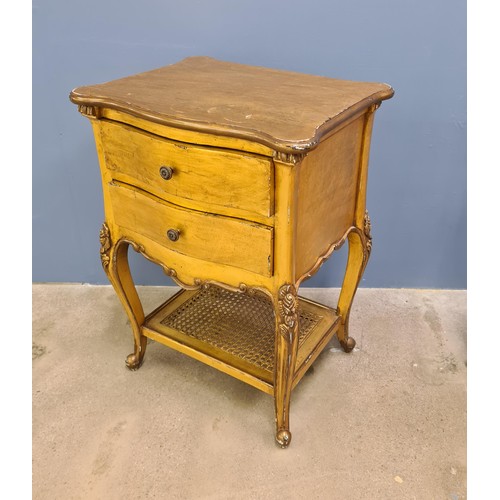 20 - A pair of Louis XVI style nightstands. Each having two drawers over inset split cane cane shelf belo... 