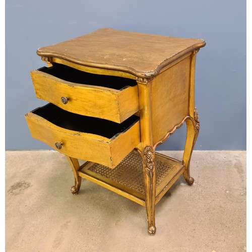 20 - A pair of Louis XVI style nightstands. Each having two drawers over inset split cane cane shelf belo... 