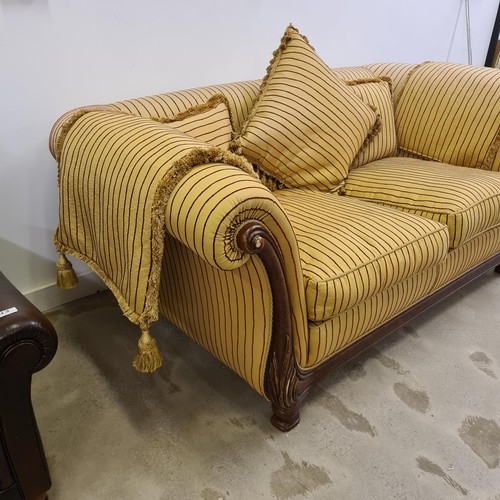 35 - Regency style double scroll end sofa.