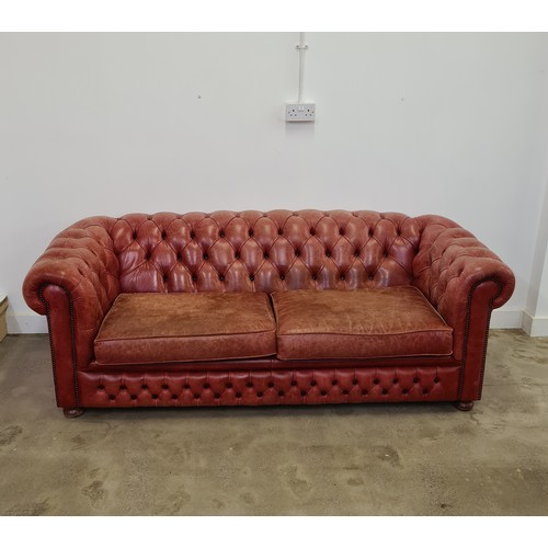 26 - Chesterfield three-seater sofa by Sofa Classics. 43 (floor to seat) x 71 (floor to back) x 204 (w) x... 