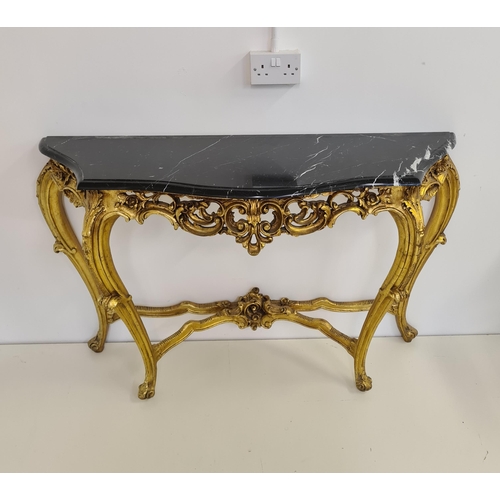 51 - Louis XV style demi lune table having black marble top raised on gilt frame. 82 (h) x 128 (w) c... 