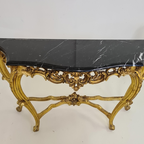 51 - Louis XV style demi lune table having black marble top raised on gilt frame. 82 (h) x 128 (w) c... 