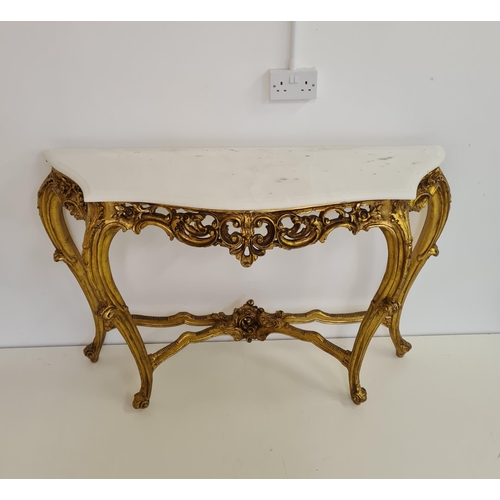 52 - Louis XV style demi lune table having white marble top raised on gilt frame. 82 (h) x 128 (w) cm.