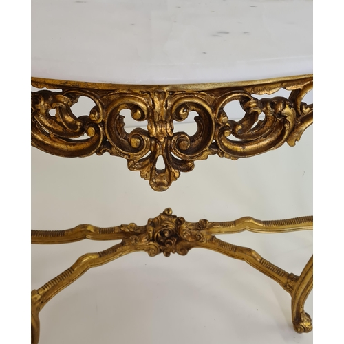 52 - Louis XV style demi lune table having white marble top raised on gilt frame. 82 (h) x 128 (w) cm.