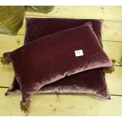 77 - Two matching cushions, the largest being 65 x 65 cm.