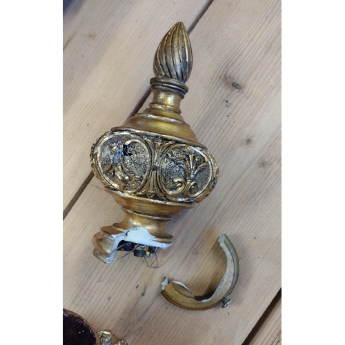 102 - Rococo style curtain pole in gilt finish with holdbacks. 270 cm in length.