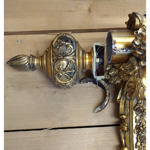 103 - Rococo style curtain pole in gilt finish with holdbacks. 213 cm in length.