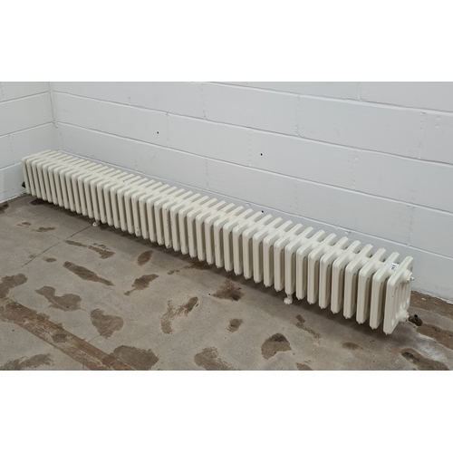 165 - A 44 section cast iron radiator. 36 (h) x 282 (w) x 25 (d) cm.