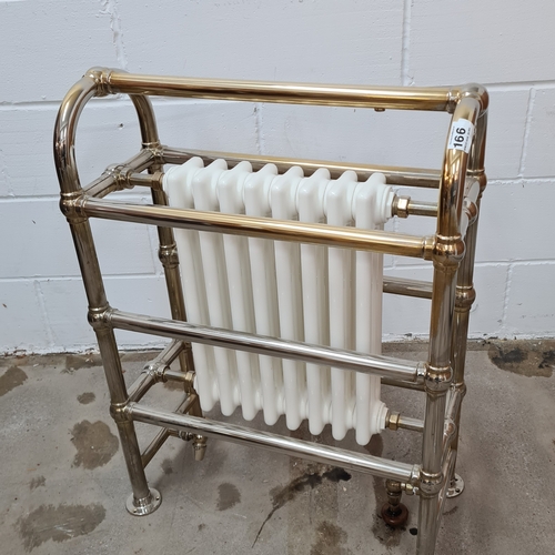 166 - Cast iron and polished chrome towel radiator. 87 (h) x 63 (w) x 30 (d).