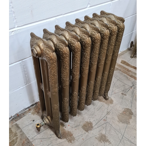 180 - A Rococo style, 2 column, 8 section cast iron radiator in antiqued finish. Standing 75 (h) x 89 (w) ... 