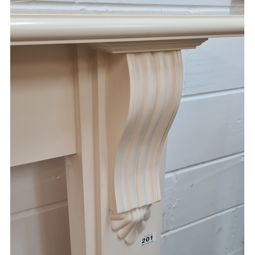 201 - An antique white painted wooden fire surround. 115 (h) x 142 (w) x 24 (d).