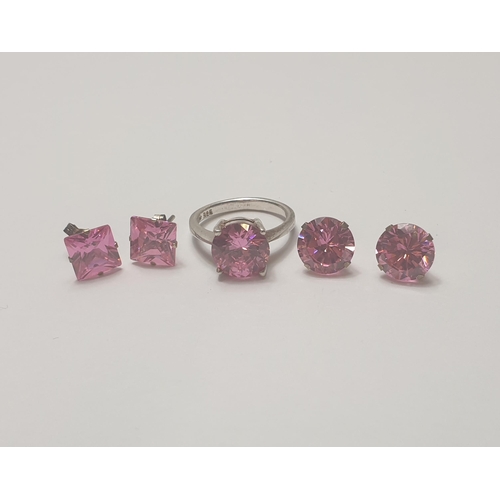 257 - 925 silver and pink stone jewellery set comprising earrings and ring, size L. Shipping Group (A).
