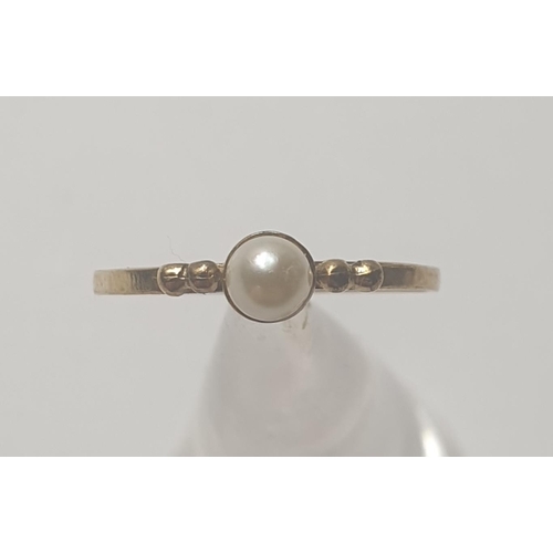 259 - Pearl set gold coloured metal ring, size L. Shipping Group (A).