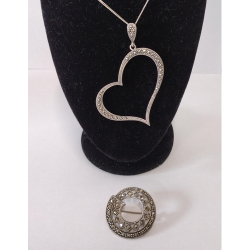 260 - 925 silver heart-shaped marcasite pendant and chain with brooch. Shipping Group (A).