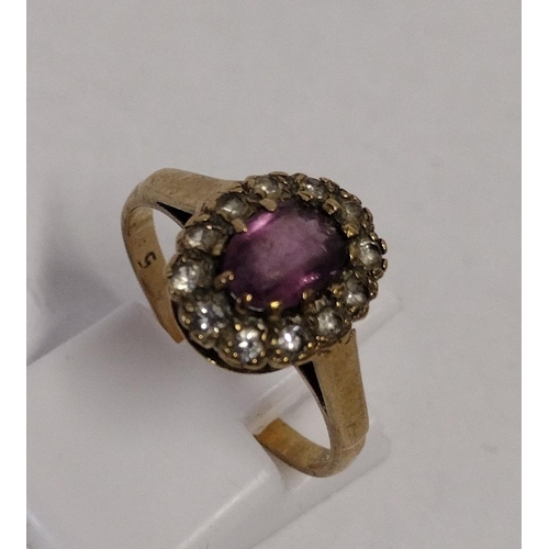 268 - 9ct yellow gold and amethyst halo ring, size N, 2.1g. Shipping Group (A).