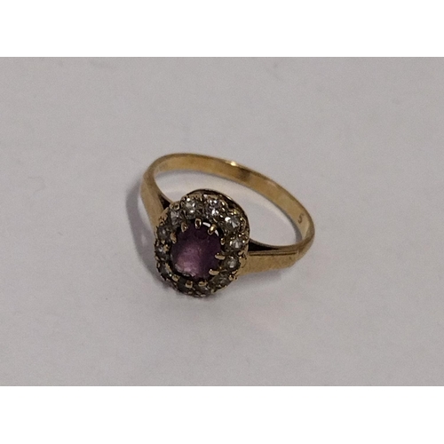 268 - 9ct yellow gold and amethyst halo ring, size N, 2.1g. Shipping Group (A).