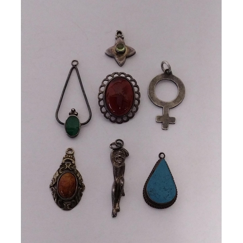 274 - Seven .925 silver pendants to include amber, peridot, carnelian etc. approx. gross weight 16.5g. Shi... 