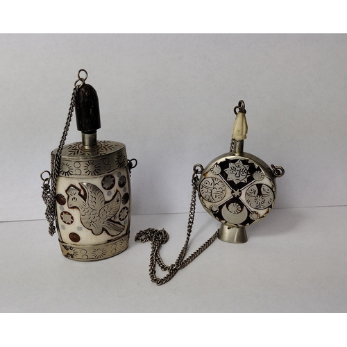 277 - Two Oriental white metal and carved bone scent bottles, tallest 9cm. Shipping Group (A).