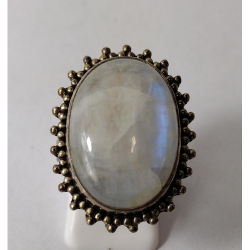 293 - Large 925 silver Moonstone cabochon ring. Size R. Shipping Group (A).