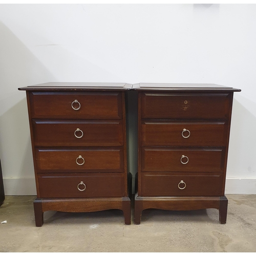 16 - A pair of Stag Minstrel 3-drawer bedside units. 71 x 53 x 46 cm.