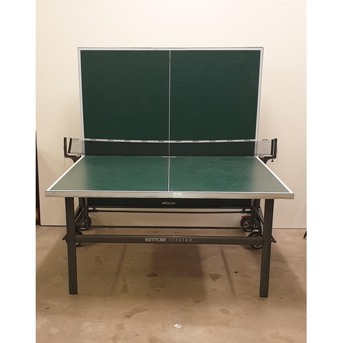 28 - A folding Kettler full-size table tennis table, very good condition. 76 x 153 x 274 cm
