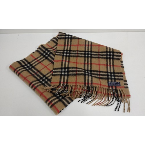 56 - Genuine 'Burberry' scarf. Shipping Group (A).