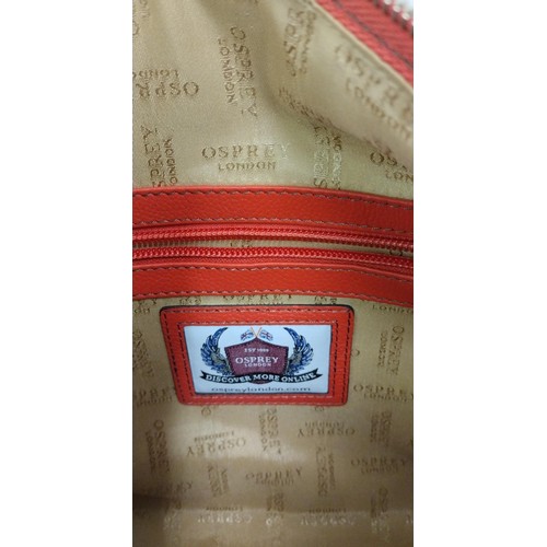 53 - 'Osprey' red handbag. Shipping Group (A).