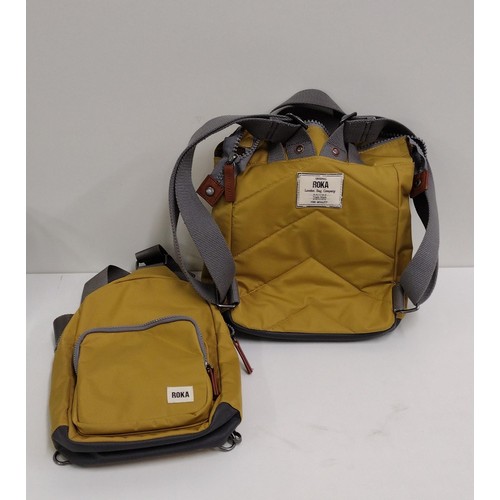 50 - London Bag Company ochre 'ROKA' backpacks (2). Shipping Group (A).