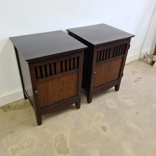 34 - A pair of modern bedside cabinets. 67 (h) x 48 (w) x 45 (d).