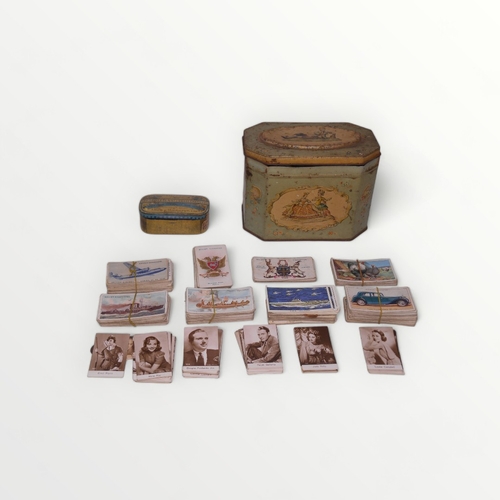 150 - Original 'Huntley & Palmers' biscuit tin containing numerous cigarette cards and a smaller 'past... 