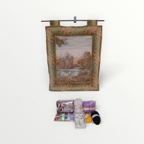 170 - Two modern tapestry wall hangings with poles and a selection of new wool.