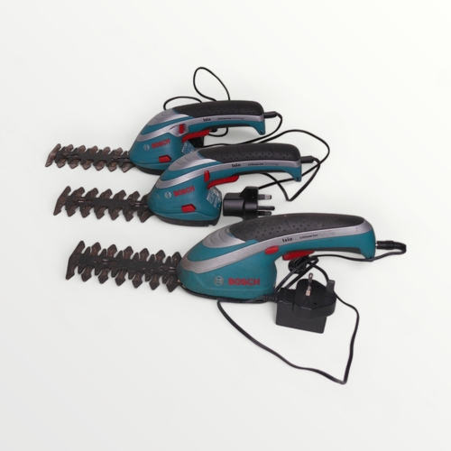 173 - Three small cordless rechargeable 'Bosch' hedge trimmers.