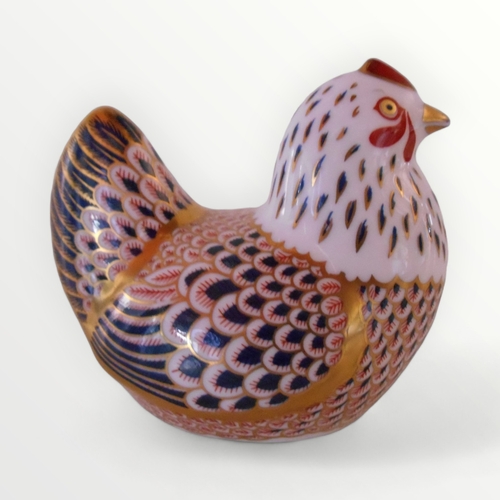 235 - Royal Crown Derby chicken paperweight with silver button, 8cm high. Shipping group (A).