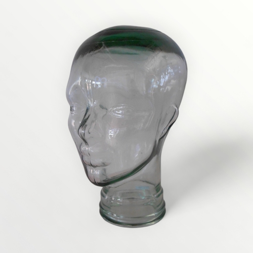 254 - Moulded glass display head 29cm high.