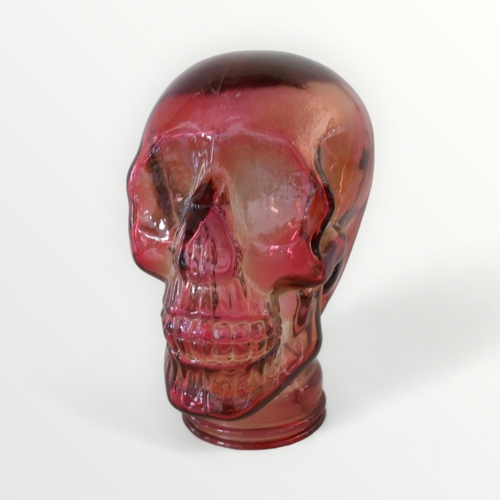 256 - Moulded glass display skull, 26cm high.