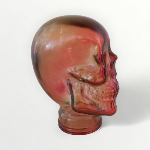 256 - Moulded glass display skull, 26cm high.