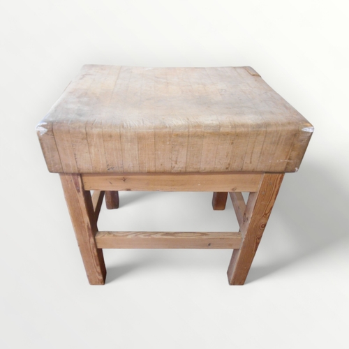 269 - Substantial probably beech vintage 'butchers block' having a plain pine four legged stand. 83 x 76 x... 