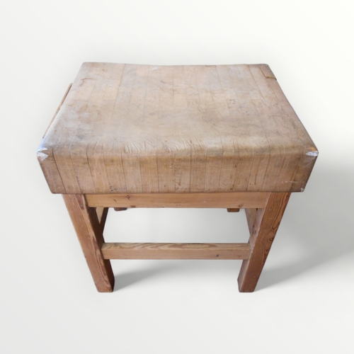 269 - Substantial probably beech vintage 'butchers block' having a plain pine four legged stand. 83 x 76 x... 