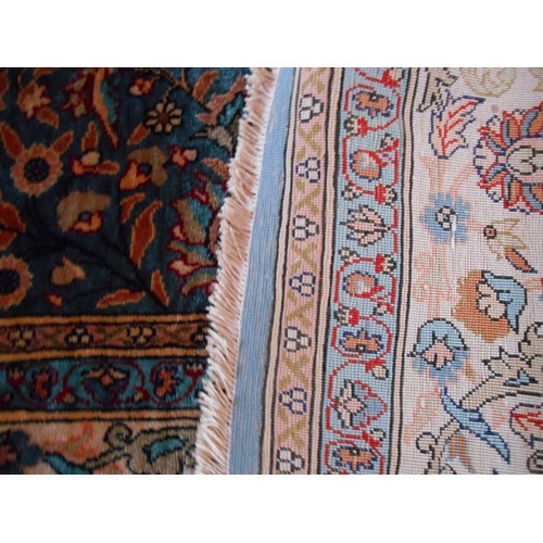 277 - A very fine silk carpet with blue ground floral central field within floral guard boarders. 131 x 19... 