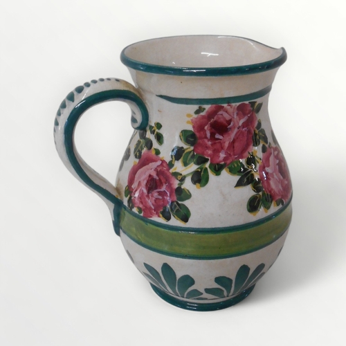 190 - Wemyss pottery jug hand painted with pink roses over an incised green band with stylised lappets bel... 