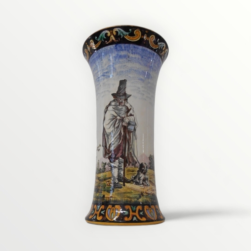 191 - Gien hand painted faience pottery vase depicting a blind beggar with his dog and a wandering musicia... 