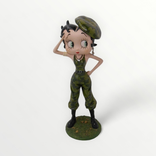 255 - Free standing 'Betty Boop' in fanciful military attire, 33cm tall. Shipping group (A).